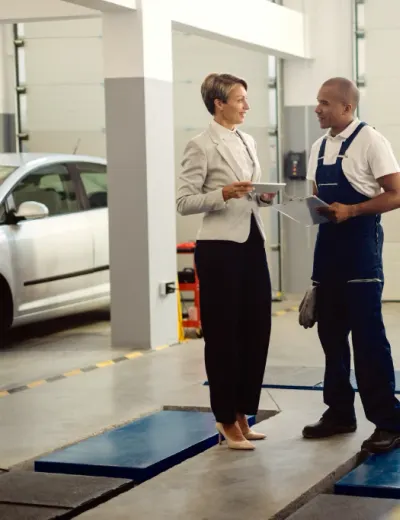 Automotive repair shop owner and service advisor